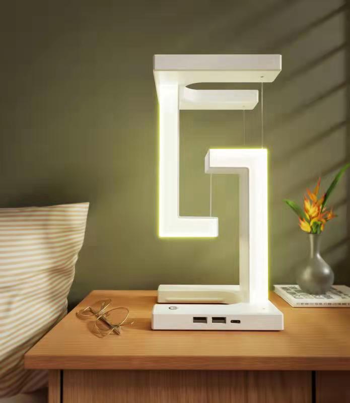 Creative Floating Balance Lamp with Wireless Phone Charging – Modern Suspension Table Lamp for Home & Bedroom Décor"