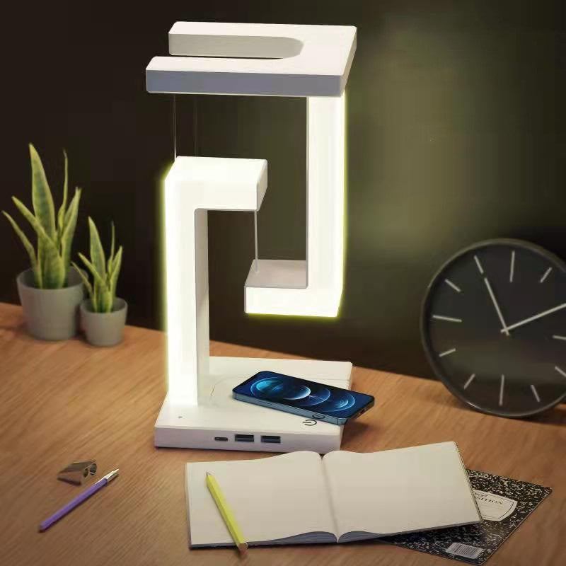Creative Floating Balance Lamp with Wireless Phone Charging – Modern Suspension Table Lamp for Home & Bedroom Décor"